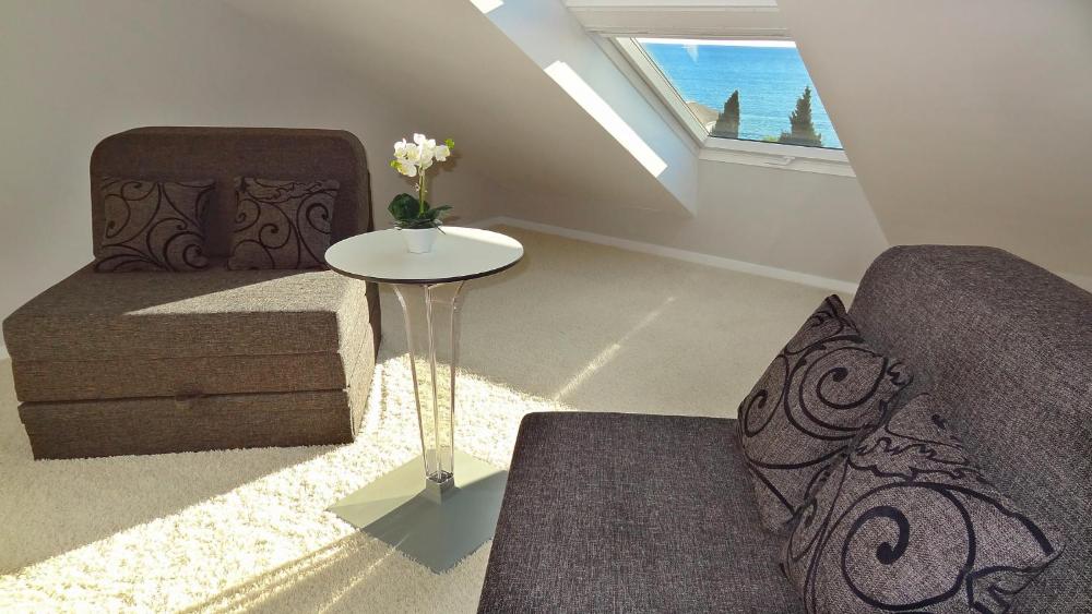 Luxury Suite with Side Sea View and Balcony