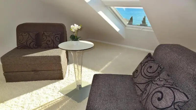 Luxury Suite with Side Sea View and Balcony
